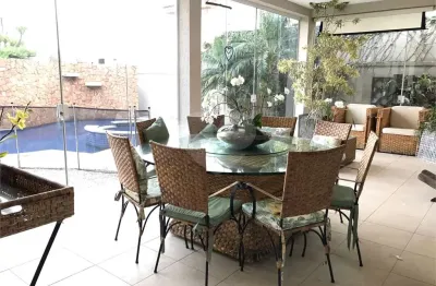 Casa em condomínio fechado com 4 quartos para alugar na alameda jaguaruna, 570, residencial morada dos lagos, barueri, 420 m2 por r$ 15.000