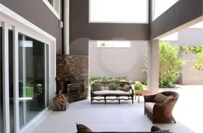 Casa em condomínio fechado com 5 quartos à venda na praça china, 648, tamboré, santana de parnaíba, 1005 m2 por r$ 14.900.000