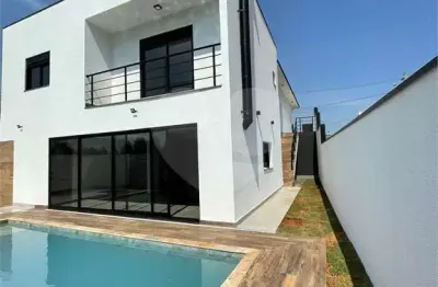 Casa em condomínio fechado com 4 quartos à venda na rua guarantã, 171, residencial pecan, itupeva, 303 m2 por r$ 1.748.000