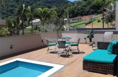 Casa em condomínio fechado com 4 quartos à venda na rua sabiá, 1226, praia da lagoinha, ubatuba, 230 m2 por r$ 2.699.000