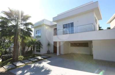 Casa em condomínio fechado com 4 quartos à venda na alameda áries, 82, alphaville, santana de parnaíba, 356 m2 por r$ 3.750.000