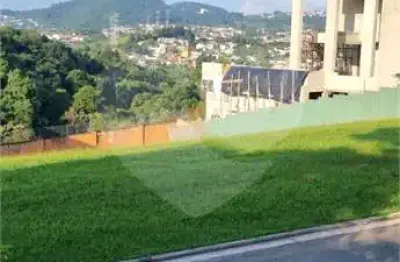 Terreno em condomínio fechado à venda na alameda rembrandt, 95, alphaville, santana de parnaíba, 691 m2 por r$ 1.650.000
