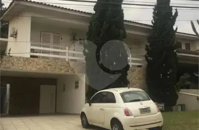 Casa em condomínio fechado com 4 quartos para alugar na alameda topázio, 824, alphaville, santana de parnaíba, 370 m2 por r$ 12.000