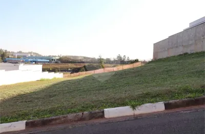 Terreno em condomínio fechado à venda na alameda flávia, 820, dois córregos, valinhos, 1000 m2 por r$ 800.000