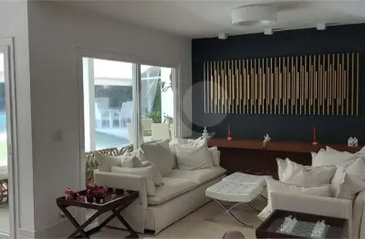 Casa em condomínio fechado com 4 quartos à venda na avenida bom pastor, 1010, alphaville, santana de parnaíba, 694 m2 por r$ 7.000.000