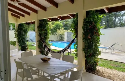 Casa com 4 quartos à venda na avenida manoel nascimento júnior, 76, jardim virgínia, guarujá, 452 m2 por r$ 2.599.000