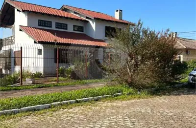 Casa com 3 quartos à venda na rua monsenhor leopoldo neis, 493, dom feliciano, gravataí, 330 m2 por r$ 1.379.000