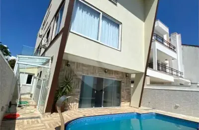 Casa em condomínio fechado com 5 quartos à venda na rua andradina, 700, cidade parquelandia, mogi das cruzes, 300 m2 por r$ 2.490.000