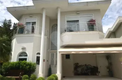 Casa em condomínio fechado com 4 quartos para alugar na alameda bertioga, 368, alphaville, santana de parnaíba, 400 m2 por r$ 30.000