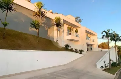 Casa em condomínio fechado com 4 quartos à venda na estrada dos índios, 5, chácaras copaco, arujá, 391 m2 por r$ 4.950.000