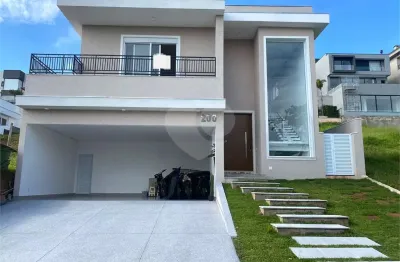 Casa em condomínio fechado com 4 quartos à venda na alameda das sapucaias, 200, alphaville, santana de parnaíba, 438 m2 por r$ 5.400.000