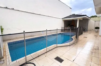 Casa em condomínio fechado com 4 quartos à venda na alameda barretos, 11, alphaville, santana de parnaíba, 391 m2 por r$ 3.200.000