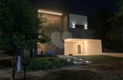 Casa em condomínio fechado com 4 quartos à venda na alameda libra, 129, alphaville, santana de parnaíba, 450 m2 por r$ 4.985.000