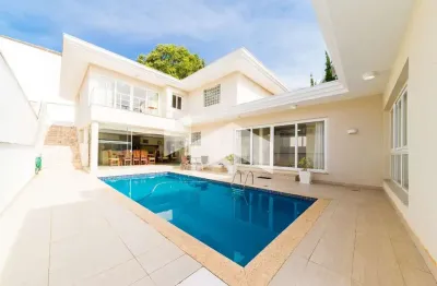 Casa de condomínio com 431.49 m², 4 quartos sendo 4 suítes para alugar no bairro taboão.