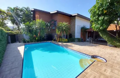 Linda casa 4 suítes, jardim, piscina, 6 vagas, enseada
