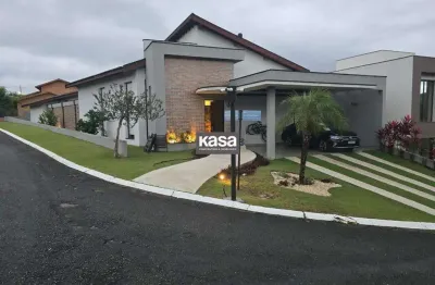 Casa à venda com 4 suítes no condomínio flamboyan em bragança paulista-sp