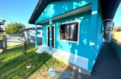 Casa com 2 dormitórios e piscina à venda, 75 m² por R$ 402.800 - Parque dos Anjos - Gravataí/RS