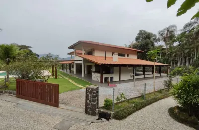 Ubatuba, ressaca - magnifica casa em condomínio, 06 dormitórios (04 suítes), amplo terreno de 5.000,00 mts2.