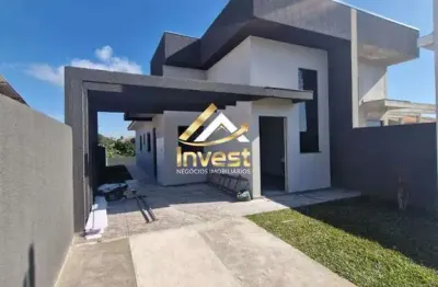 Casa espaçosa com 3 quartos, pé direito alto e grande terreno – conforto e estilo com passagem lateral!