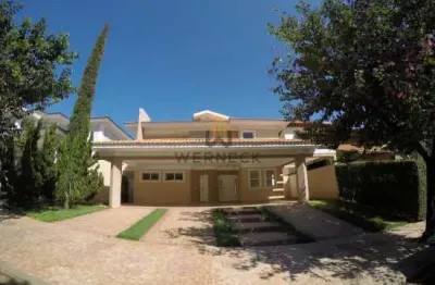 Casa em condominio -sobrado alto padrão com 4 amplas suítes