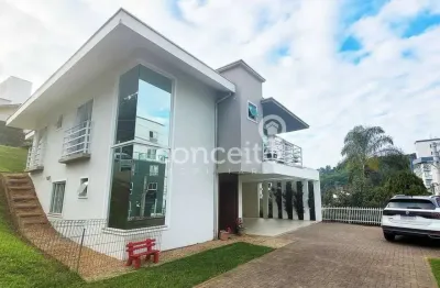 Casa semimobiliada com 4 dormitórios e 7 vagas na itoupava seca!