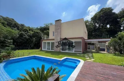 Casa moderna e sofisticada com vista panorâmica dentro de condomínio no coração da granja viana