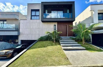 Exclusividade e sofisticação: casa de alto padrão no condomínio são paulo ii – granja viana