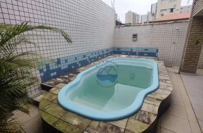 Casa de Cinema com 4 quartos com 2 suítes piscina e churrasqueira com 5 vagas cobertas perto da praia na Aviação em Praia Grande (SP) R$.1.390.000,00.