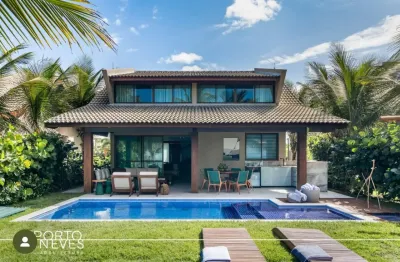 Casa frente mar de muro alto, mobiliada com 04 quartos, 03 suítes