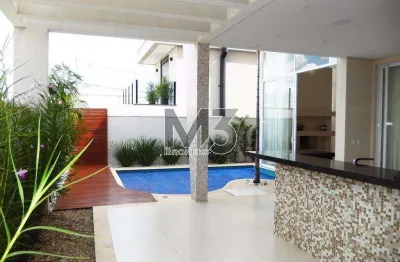 Sobrado à venda em campinas, loteamento parque dos alecrins, com 4 suítes, com 339 m²