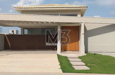 Sobrado à venda em campinas, loteamento parque dos alecrins, com 3 suítes, com 285 m²