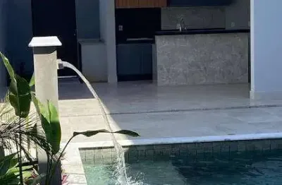 Casa térrea condomínio maria dulce 3 suítes com piscina