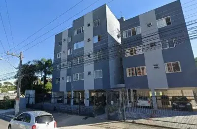 Apartamento com 02 dormitórios, sala, cozinha, banehiro e garagem.