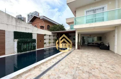 Casa com 5 dormitórios para alugar por R$ 10.000,00/mês - Praia da Enseada - Guarujá/SP
