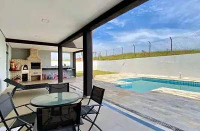 Casa com 4 suites e piscina em atibaia, condomínio shamballa iii