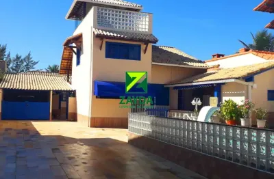Luxuosa casa com 07 quartos e piscina, no condomínio orla 500, em unamar/cabo frio.