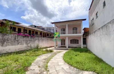 Casa à venda no centro de rio das ostras-rj: imóvel espaçoso com 3 quartos, 2 salas e 4 vagas de garagem