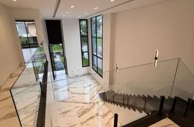 Sobrado de luxo no parqville: 4 suítes, área gourmet e piscina - 297m²