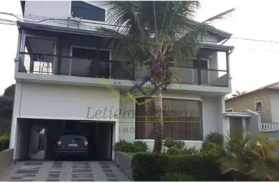 Sobrado com 4 dormitórios à venda, 344 m² por R$ 2.100.000,00 - Aruã Ecopark Lagos - Mogi das Cruzes/SP