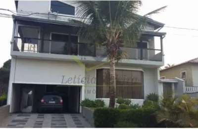 Sobrado com 4 dormitórios à venda, 344 m² por r$ 2.100.000,00 - aruã ecopark lagos - mogi das cruzes/sp