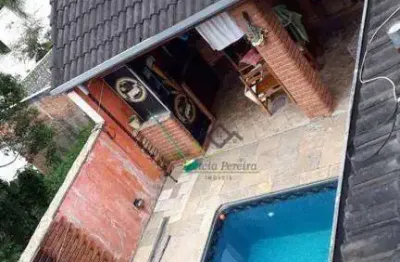 Sobrado com 4 dormitórios à venda, 330 m² por R$ 1.400.000,00 - Aruã Ecopark Lagos - Mogi das Cruzes/SP