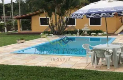 Chácara com 4 dormitórios à venda, 1680 m² por R$ 990.000,00 - Caputera - Arujá/SP