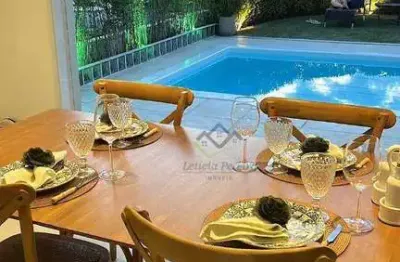 Casa com 3 dormitórios para alugar, 300 m² por r$ 22.000,00/mês - alphaville 06 - santana de parnaíba/sp