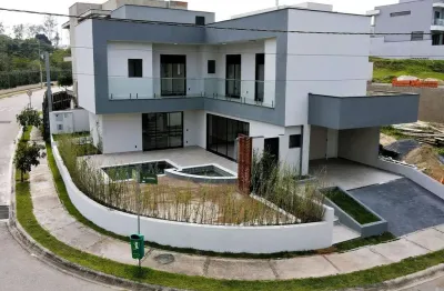 Casa com projeto moderno com 280 m², 2 salas, 3 suítes com closet, escritório e piscina, à venda no condomínio cyrella landscape esplanada