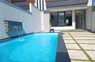 Sobrado em camboriú no bairro são francisco de assis com 03 suítes