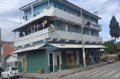 Prédio a venda com 10 apartamentos e 02 salas comerciais.