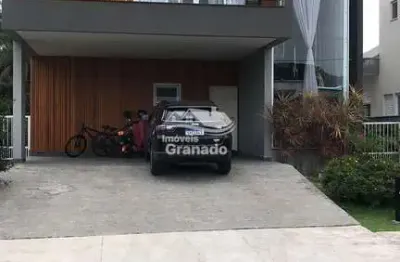 Casa no condomínio caledônia com 4 suítes à venda, santa regina, camboriu - sc