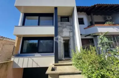 Casa com 3 quartos à venda na vila assunção, porto alegre  por r$ 1.375.000