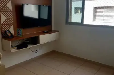 Dois dormitórios. duas vagas de garagem. elevador. guarujá.