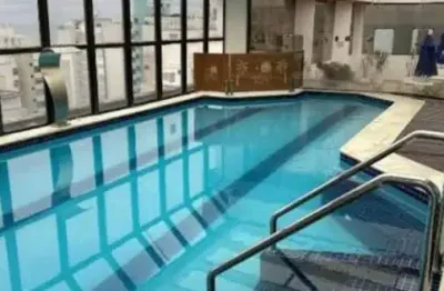 Apartamento mobiliado. duas vagas a 150 m. praia. guarujá.